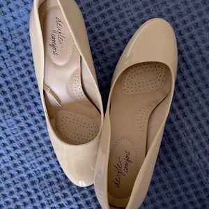 Nude heels, never worn.